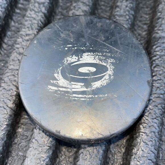 Authentic Carolina Hurricanes NHL ice hockey puck Vegum Mfg Slovakia - Picture 1 of 5
